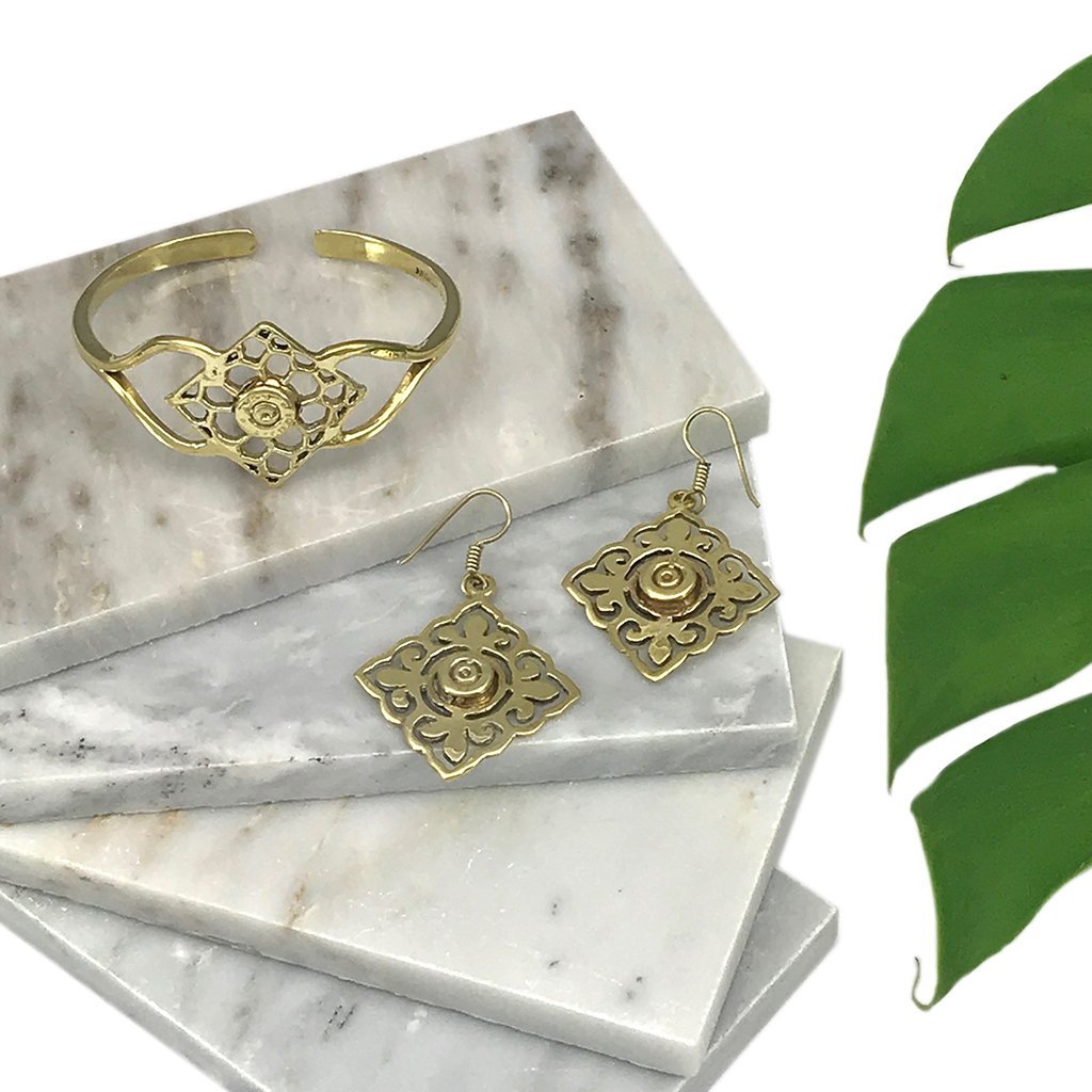 Ariel Angkor Bullet Cuff bracelet made of recycled brass, featuring a bold, textured bullet design on a sleek wristband.