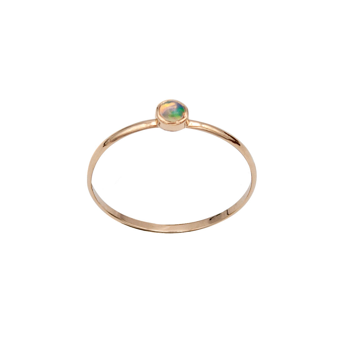 Dainty Ethiopian Opal bezel ring in 14k gold filled jewelry, showcasing a vibrant opal gemstone on a delicate band.