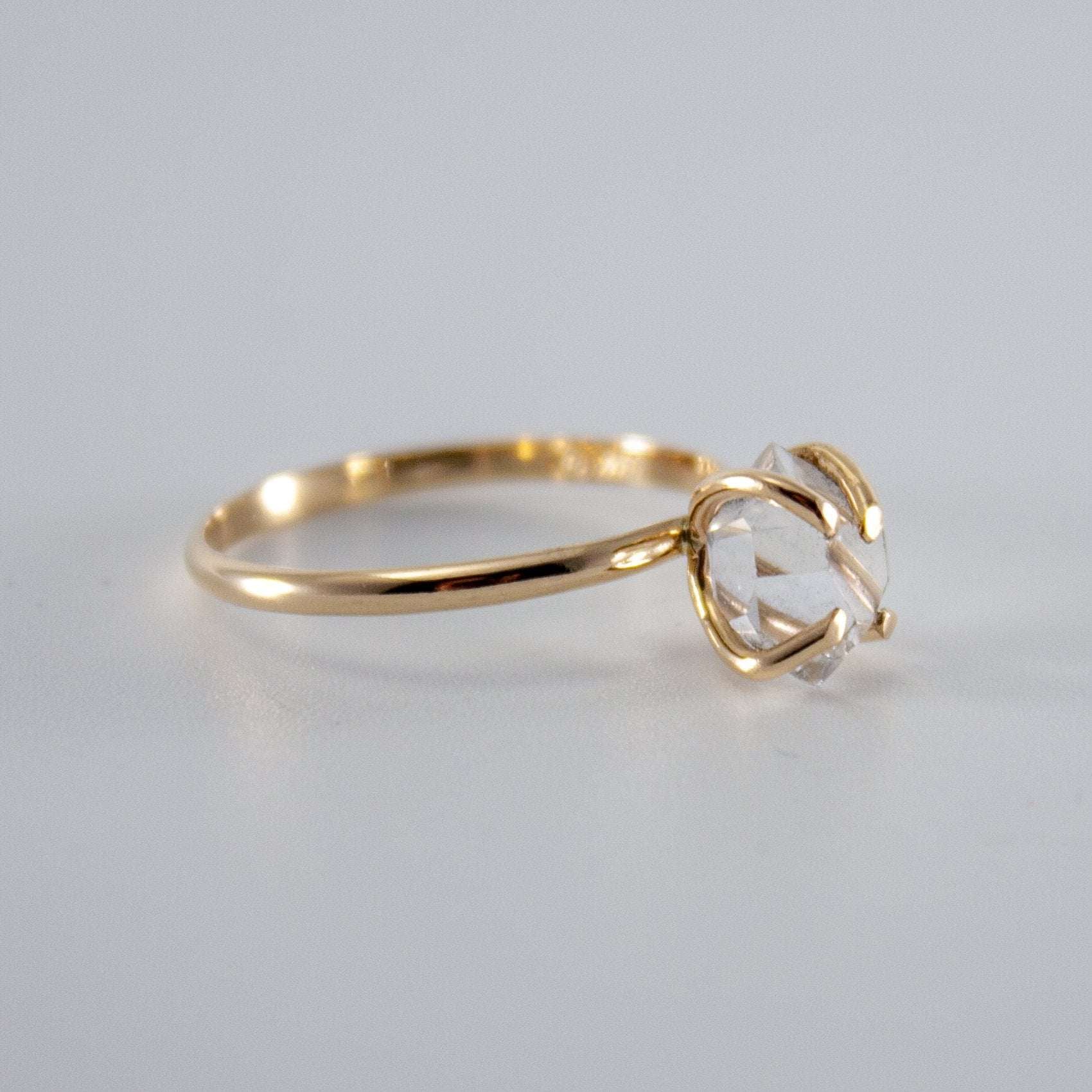 Raw Herkimer Diamond 14k gold-filled prong ring featuring a sparkling, natural diamond gemstone in a delicate jewelry design.
