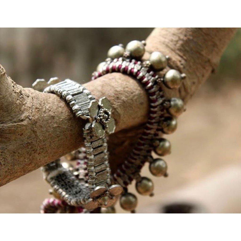 Silver Kali Flower bracelet by Ariel featuring intricate flower-shaped jewelry in fair trade silver design.