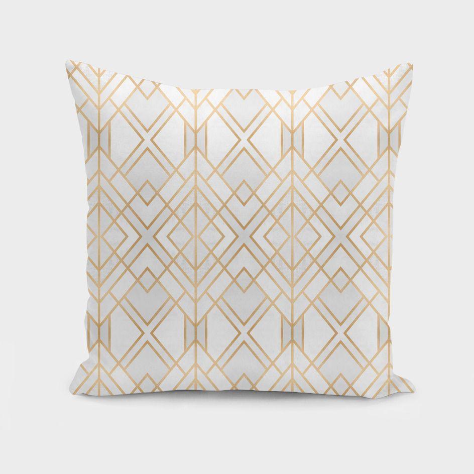 Golden Geo cushion by Scorpius featuring a modern geometric pattern on soft textile fabric.