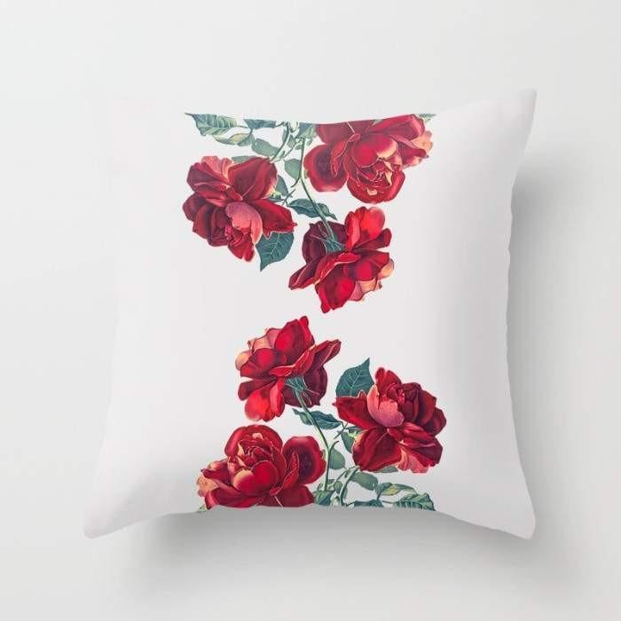 Red Roses decorative pillow by Scorpius featuring a vibrant floral print on soft textiles.