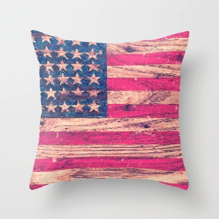 Vintage pink patriotic American flag pillow by Scorpius featuring retro wood design and classic textile details.