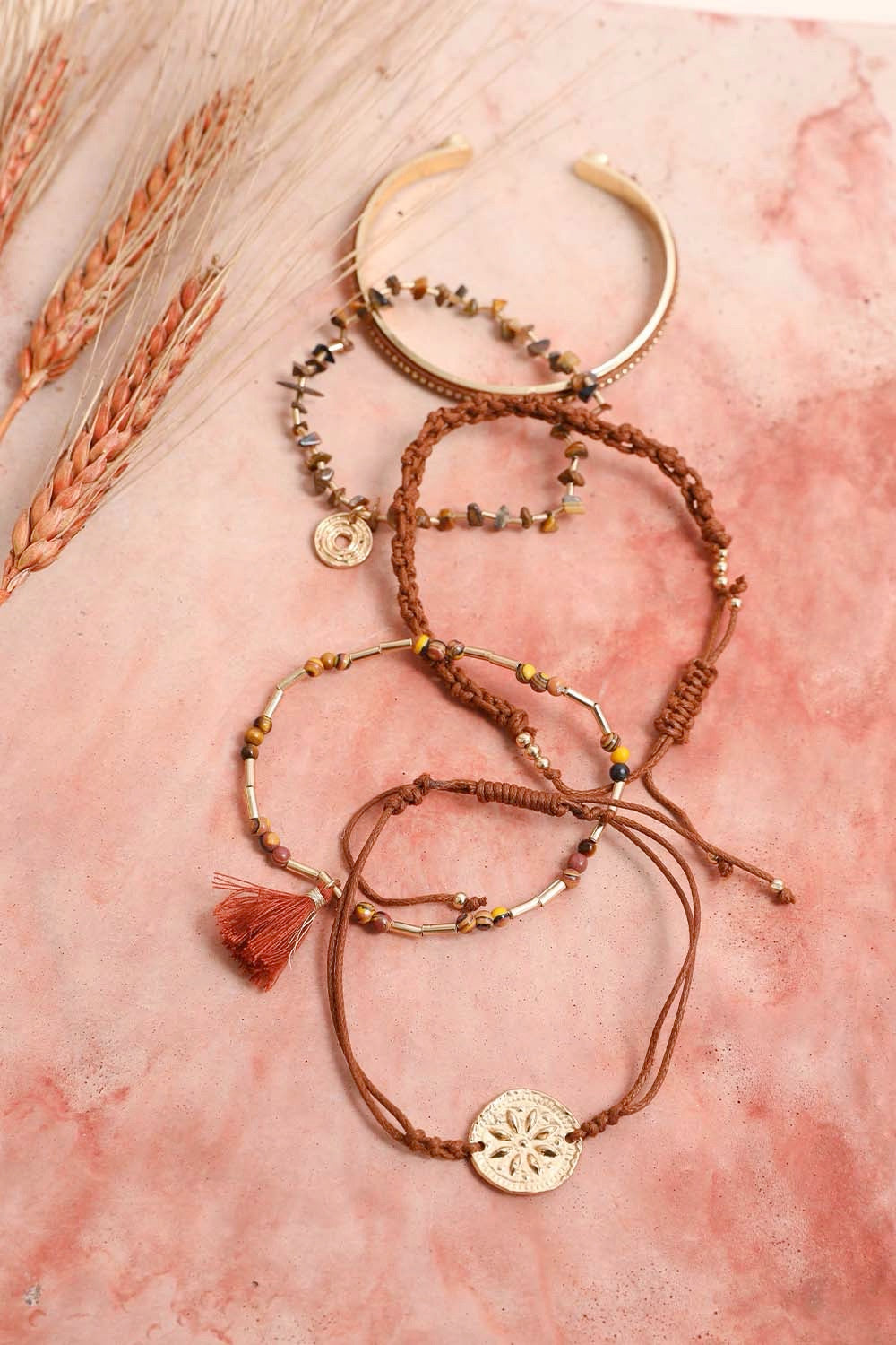 Stackable bracelet featuring polished tiger eye beads, crafted by Periwinkle Aether, perfect as a stylish accessories piece.