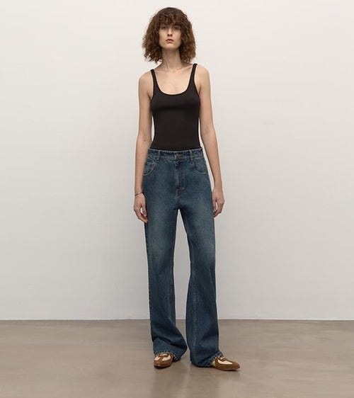 Brown Coeus long-staple cotton micro-stacked straight jeans, showcasing their fit and fabric details.