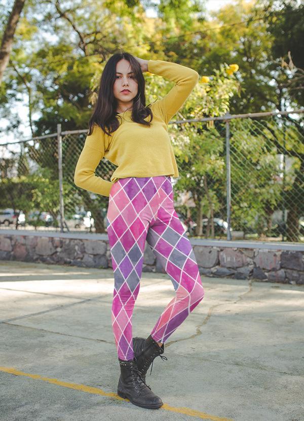 Colorful watercolor geometric pattern leggings by Sky Felix featuring vibrant abstract designs on soft fabric.