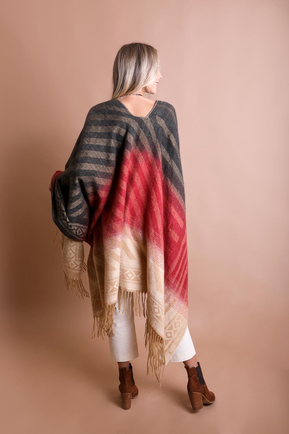 Western-style Colorblend Tassel Serape accessory with vibrant woven patterns and colorful tassels from Periwinkle Aether.
