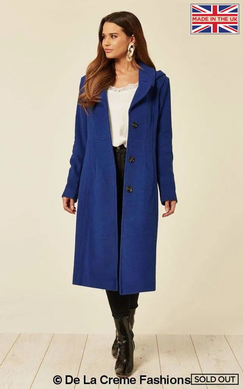 Royal blue wool blend hooded mid-length coat by Rose Eleusis, shown on a model with front view and hood detail.