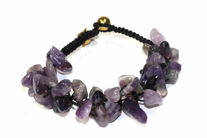 Raw Amethyst Stone Bracelet by Silver Hestia featuring irregular purple amethyst beads on a stretch cord.