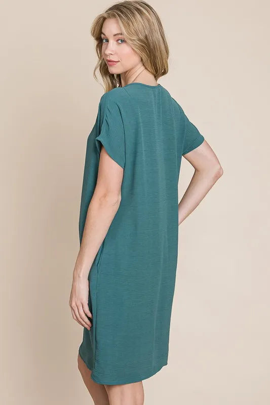Jade Icarus BOMBOM V-neck short sleeve dress for women with pockets, casual and stylish, in a vibrant color.