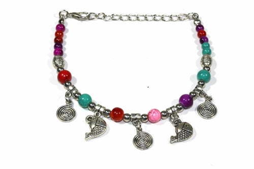 Silver Hestia Spirals and Fish Charm Bracelet featuring intricate metal charms on a sleek bracelet chain.