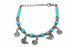Silver Hestia spirals and fish charm bracelet with detailed metal charms on a delicate chain.