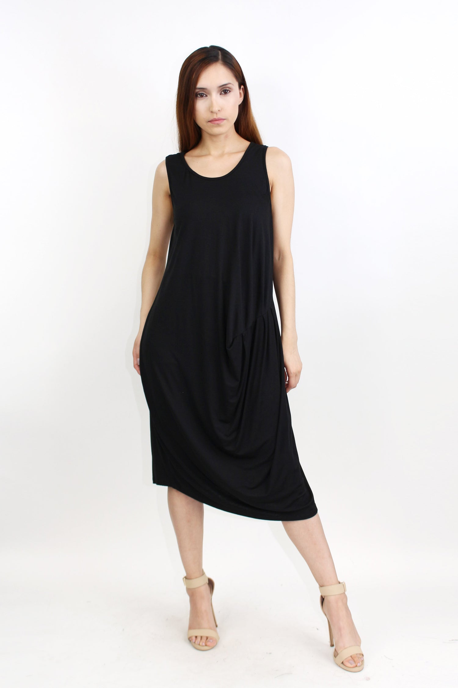 Yellow Hera pleated waist sleeveless dress with a flowy silhouette, perfect for summer occasions.