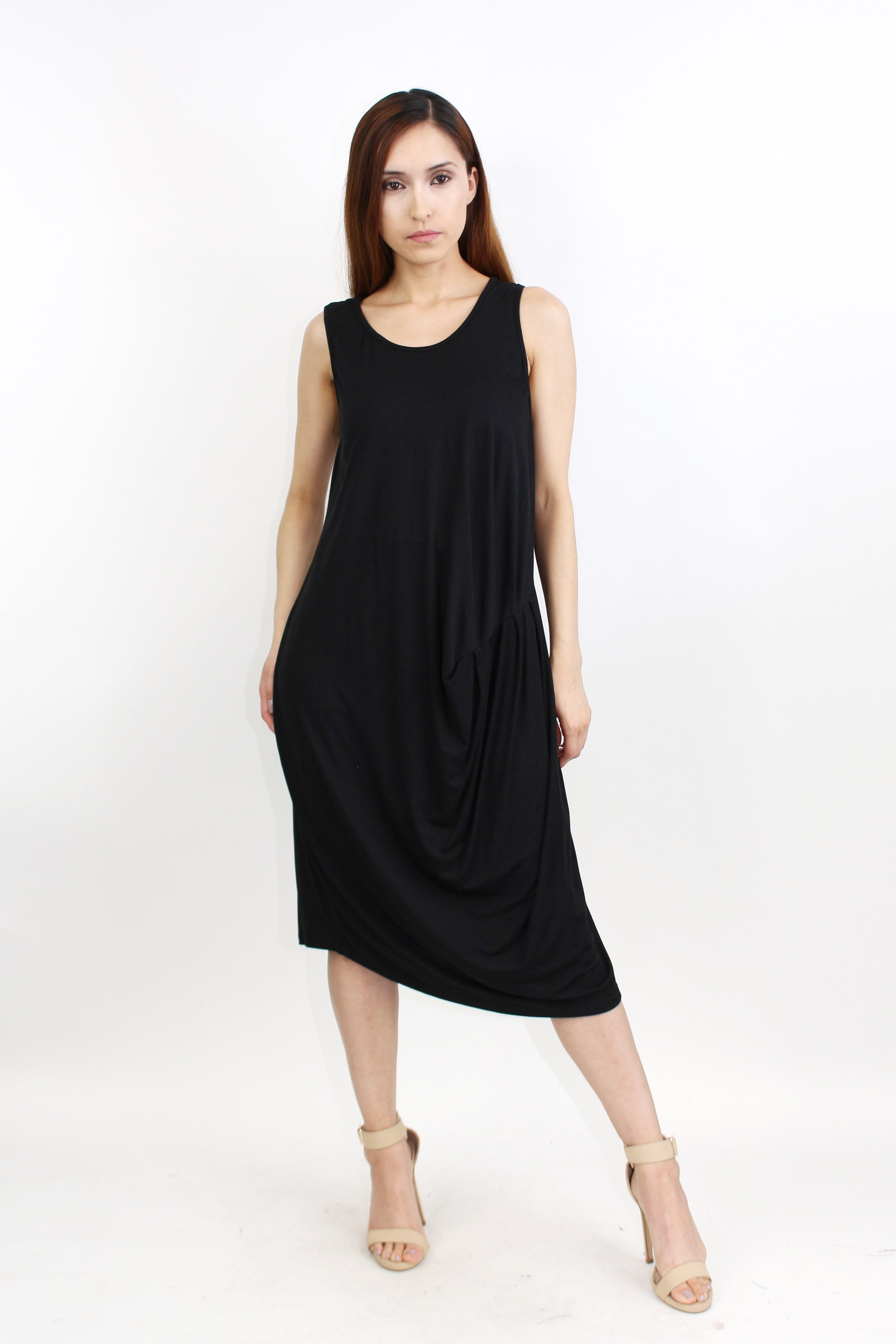 Yellow Hera pleated waist sleeveless dress with a flowy silhouette, perfect for summer occasions.