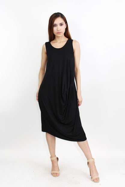 Yellow Hera pleated waist sleeveless dress with a flowy silhouette, perfect for summer occasions.