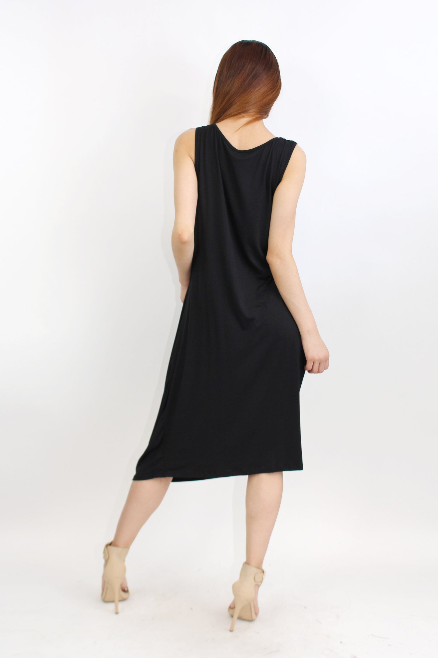 Yellow Hera pleated waist sleeveless dress with a flowy skirt and fitted bodice, perfect for summer or casual occasions.