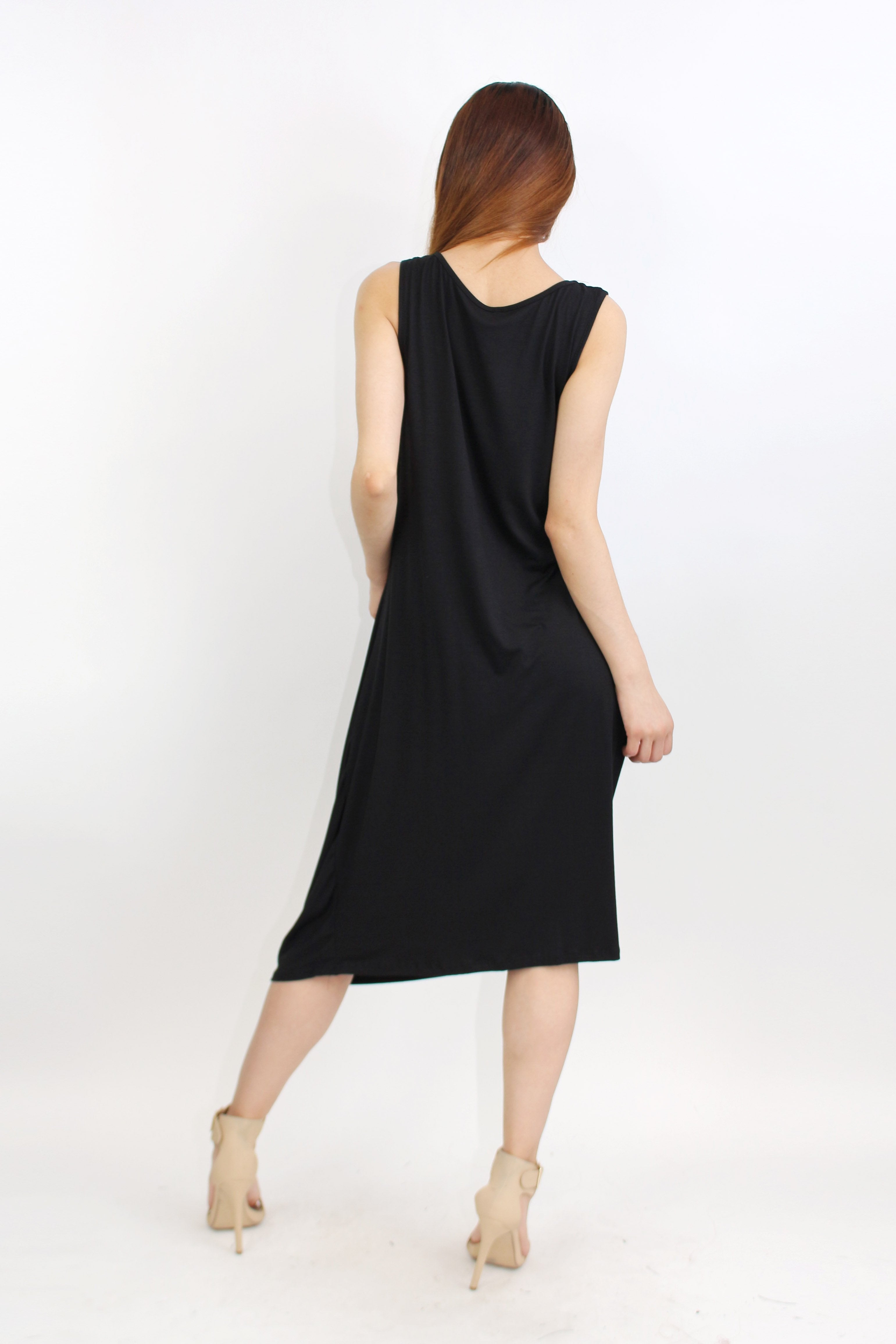 Yellow Hera pleated waist sleeveless dress with a flowy skirt and fitted bodice, perfect for summer or casual occasions.