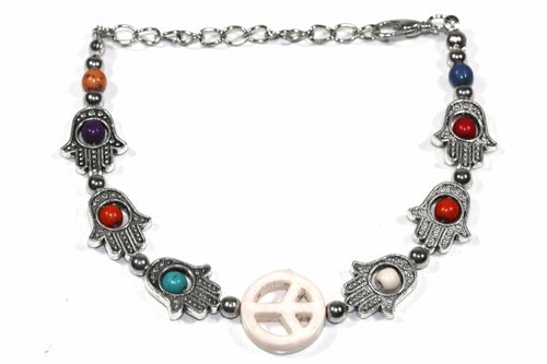 Silver Hestia Hamsa Hands and Peace bracelet featuring a silver charm with intricate design, perfect for spiritual protection and style.