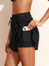 Pear Daisy high waisted drawstring swim shorts shown in a relaxed fit, featuring a comfortable waistband and casual style.