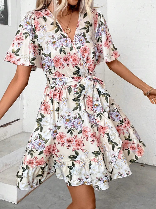 Ruby Styx printed surplice short sleeve mini dress for women, featuring a stylish and comfortable design.