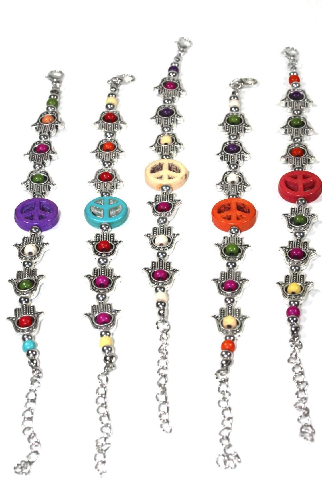 Silver Hestia Hamsa Hands and Peace bracelet with intricate charms, designed for stylish protection and peaceful vibes.