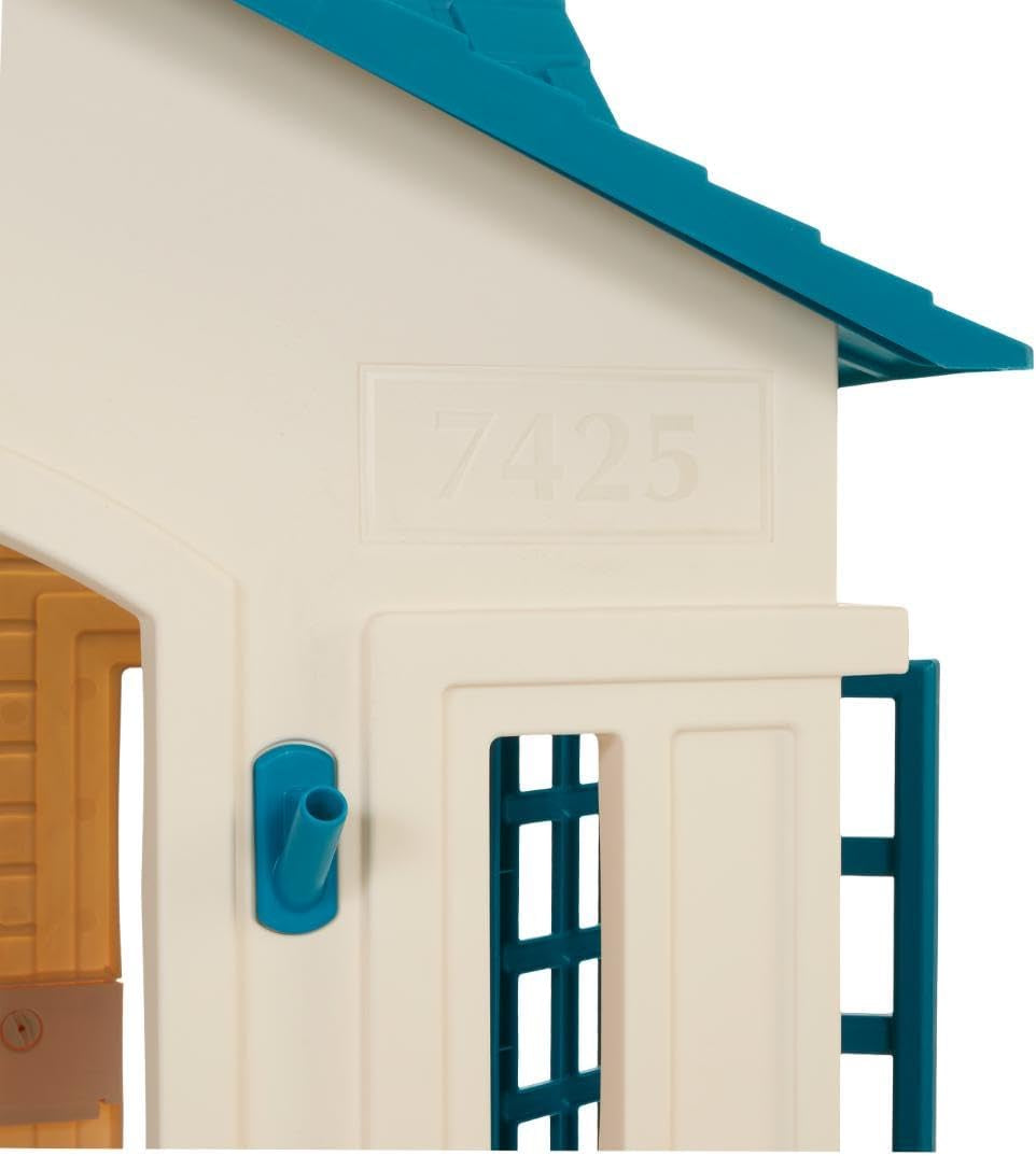 Large blue cottage playhouse for kids by Peach Maple, outdoor outdoor furniture, with windows and door for imaginative play