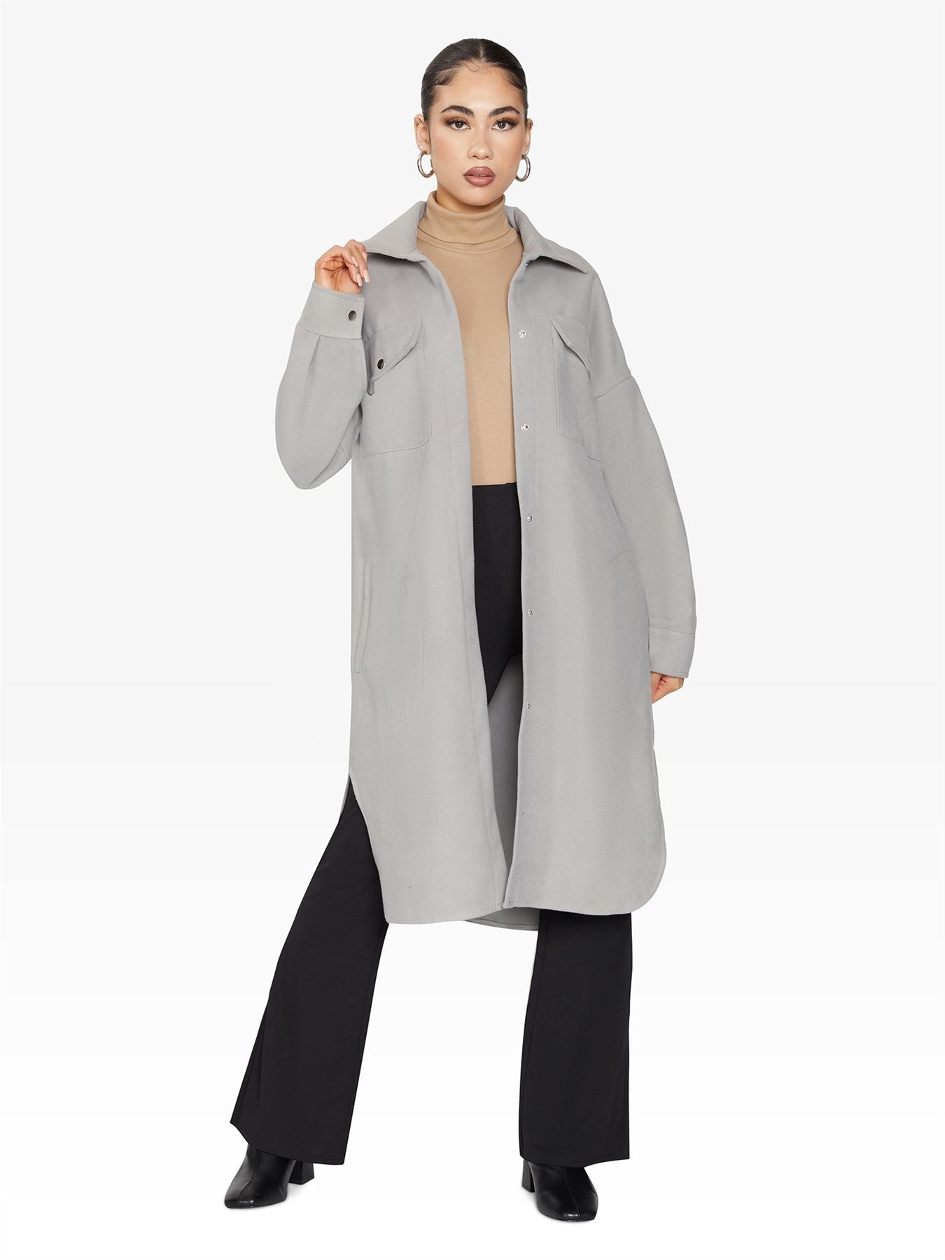 Rose Eleusis oversized longline shacket in neutral tones, stylish jacket with a relaxed fit and extended length, casual outerwear for fall.