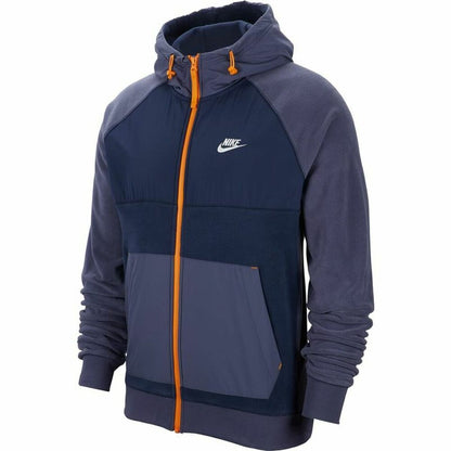 Dark blue Nike Sportswear sports jacket with lightweight design and zippered pockets, ideal for outdoor activities.