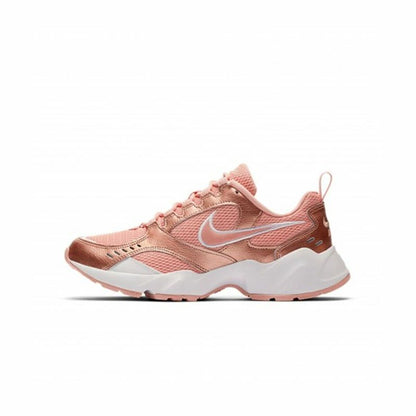Nike Air Heights Coral trainers for sports and outdoor activities, featuring vibrant coral color and athletic design.