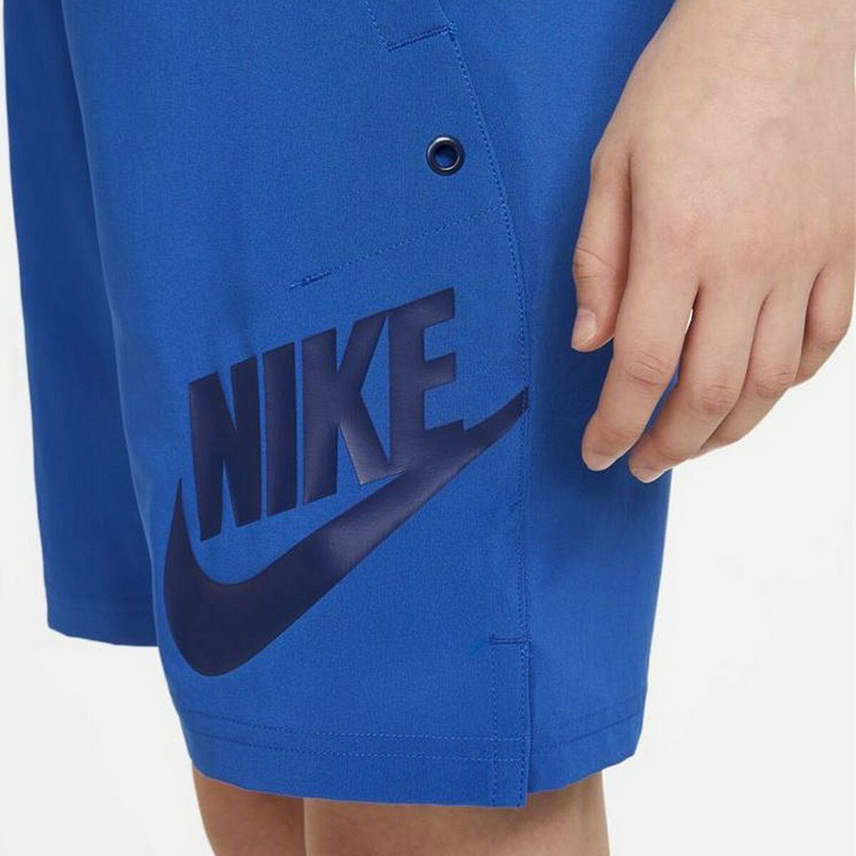 Kids Nike Sportswear sport shorts in vibrant colors, designed for outdoor activities and active play.