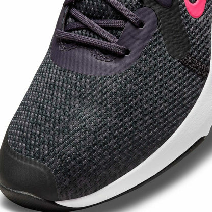 Nike TR 11 black adult running shoes with breathable mesh uppers and cushioned soles for sports and outdoor activities.