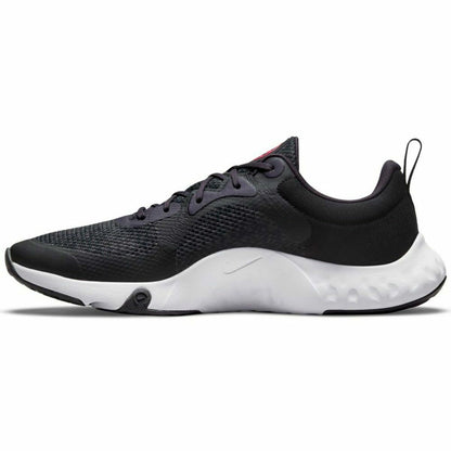 Nike TR 11 adult running shoes in black, athletic sports footwear with breathable mesh and supportive sole for active outdoor running.