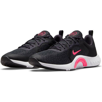 Nike TR 11 black adult running shoes with breathable mesh upper and cushioned sole for comfort during sports activities.