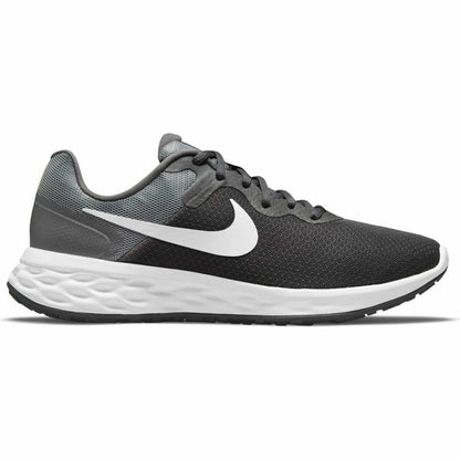 Nike Revolution 6 grey running shoes for adults, featuring breathable mesh and cushioned sole for sports and outdoor activities.