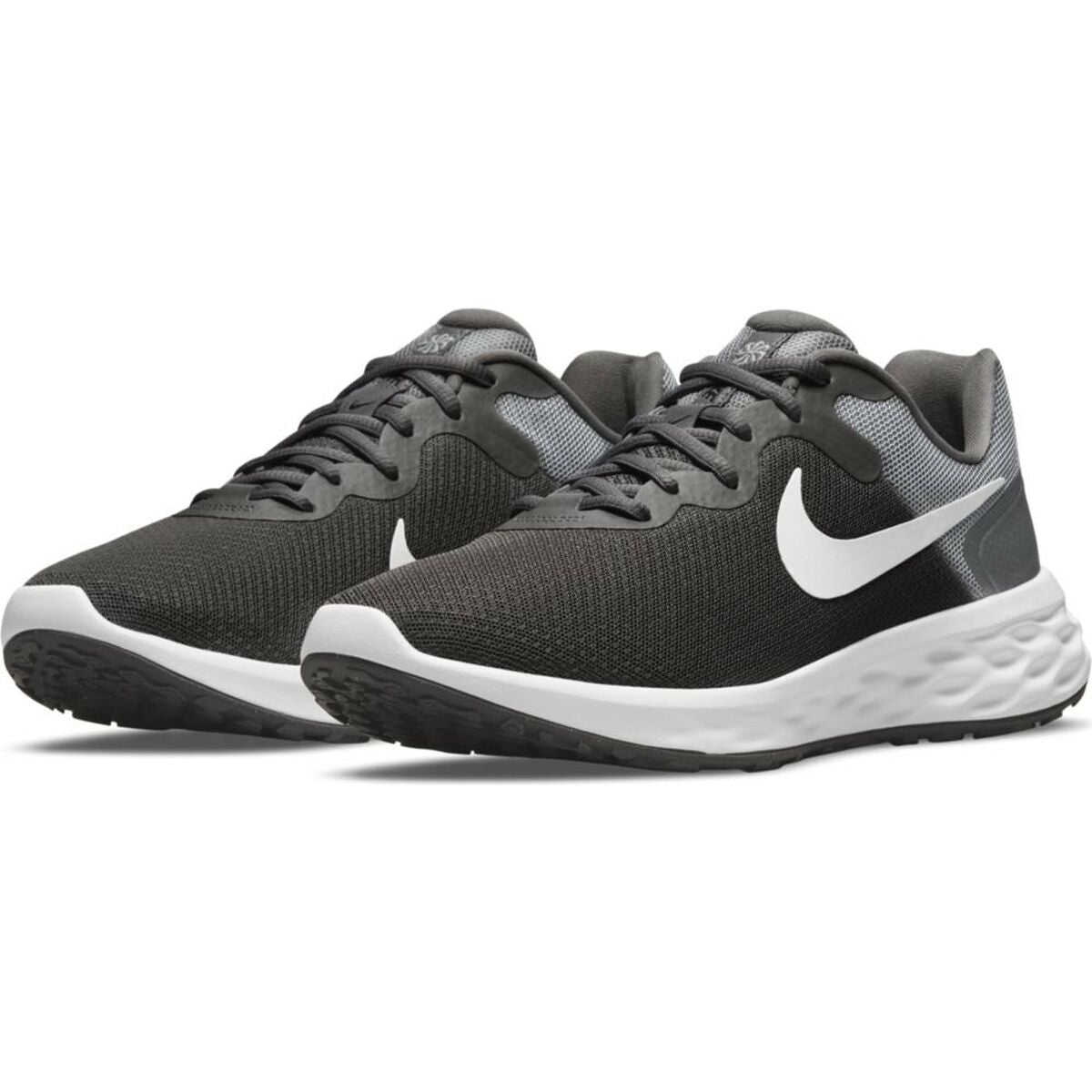 Nike Revolution 6 grey running shoes for adults, sporty design, lightweight construction, suitable for outdoor activities.