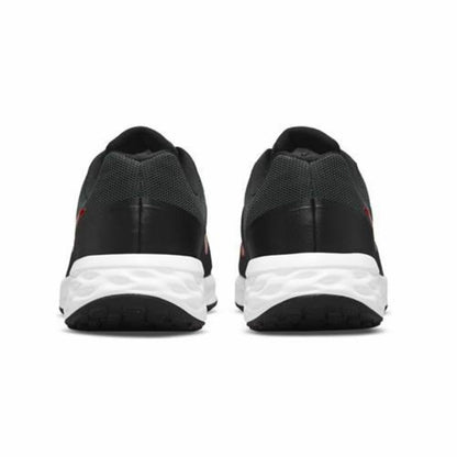 Nike Revolution 6 black running shoes for adults, featuring breathable mesh uppers and cushioned soles for comfortable outdoor activity.