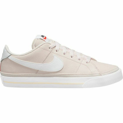 Nike Court Legacy W trainers in white and black, featuring a classic athletic design with Nike branding and comfortable lace-up style.