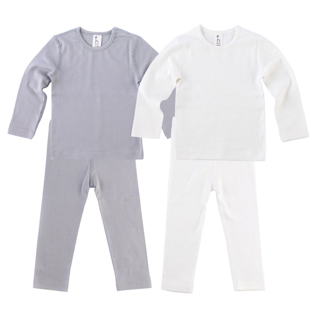 Organic cotton high-tension flat seam baby toddler pajama set by Amber Erebus, featuring soft, comfortable matching top and bottoms.