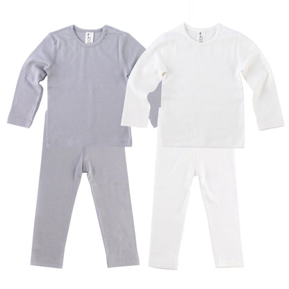 Organic cotton high-tension flat seam baby toddler pajama set by Amber Erebus, featuring soft, comfortable matching top and bottoms.