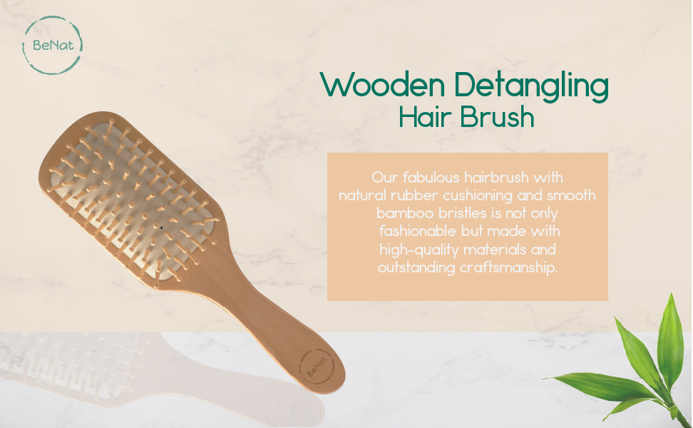 Violet Atlas wooden detangling hair brush with smooth wooden handle and wide bristles for gentle hair detangling.
