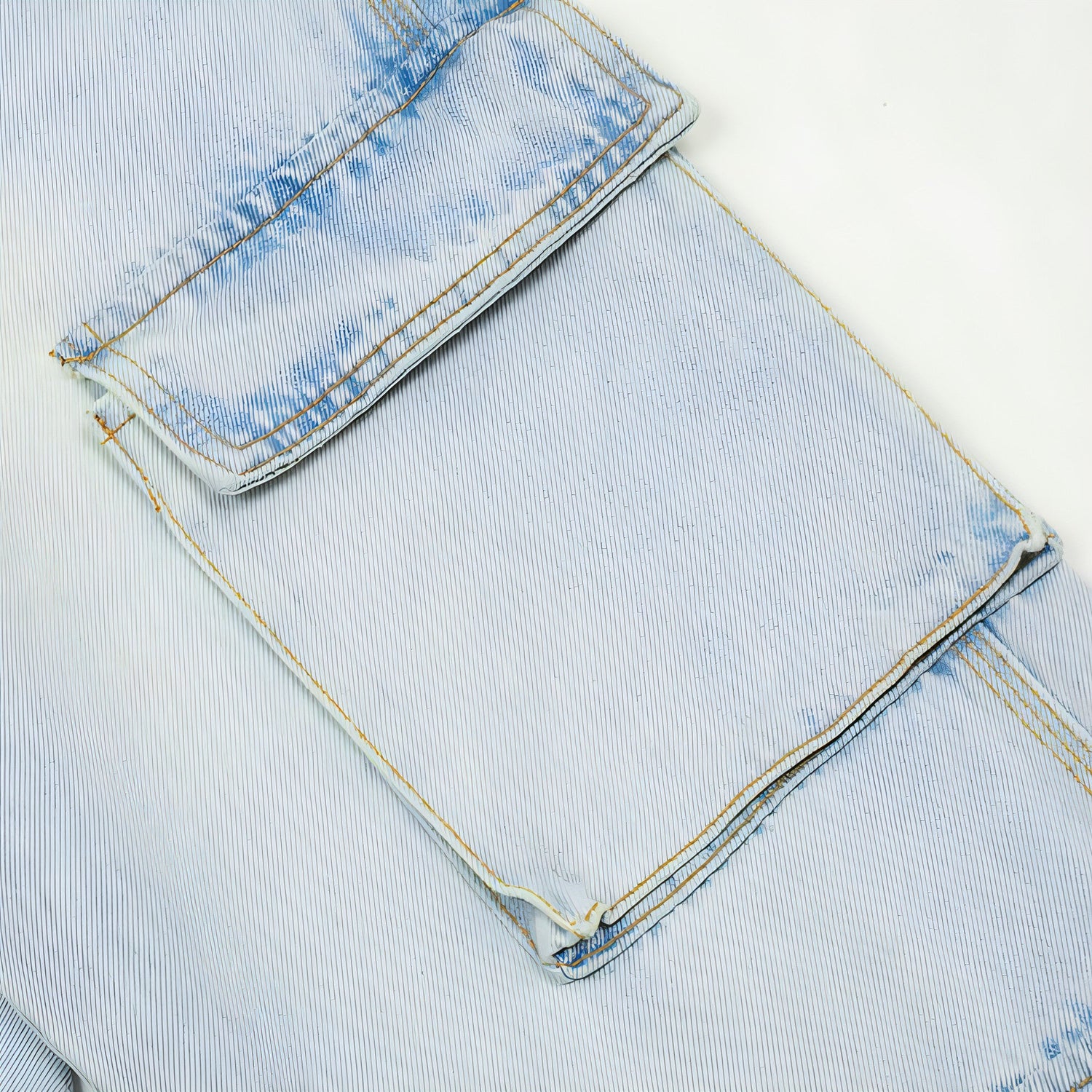 Light wash denim cargo jeans for men by Carmine Juneberry, showcasing stylish, casual denim pants with multiple cargo pockets.