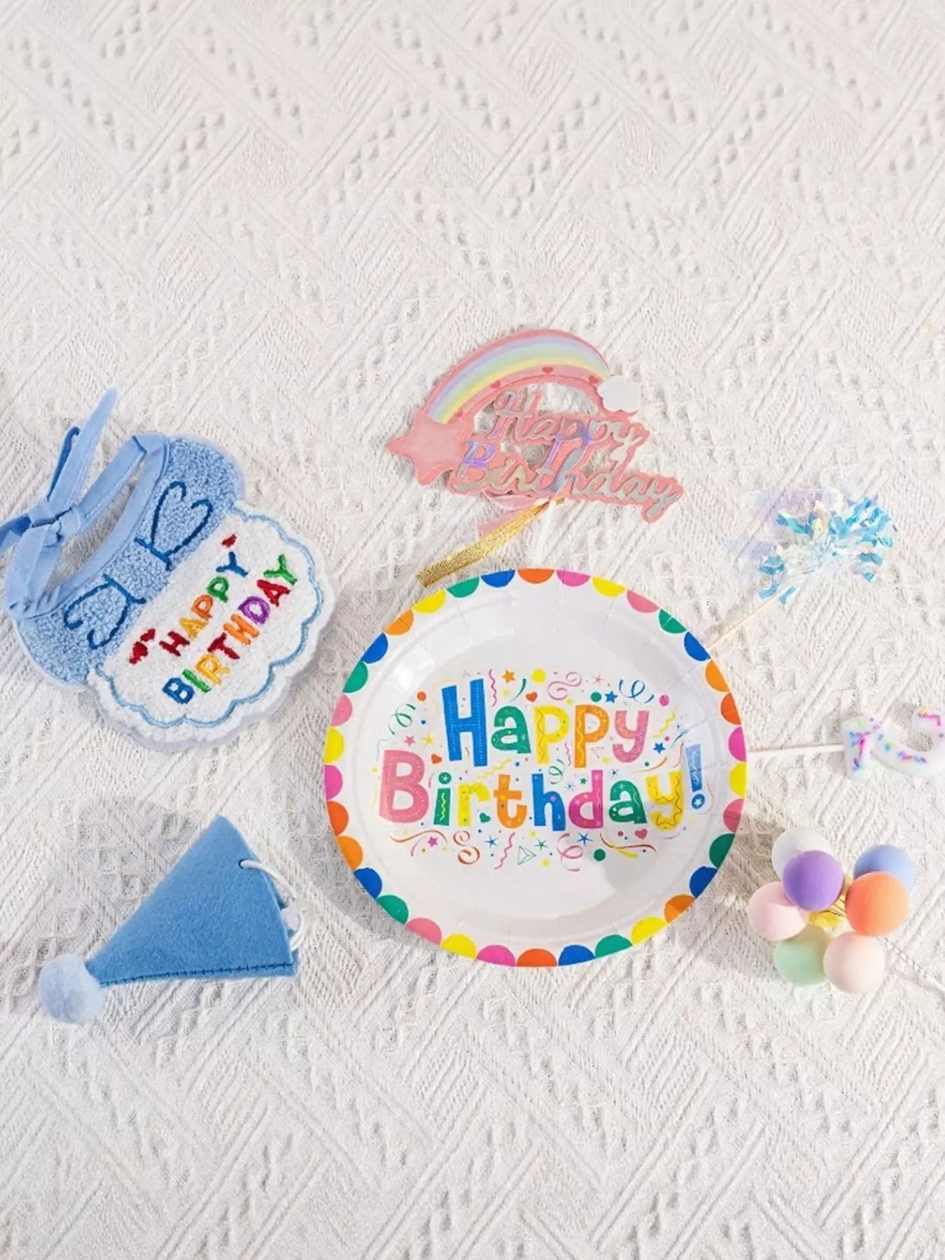 Set of 7 pet birthday hats and scarves by Pear Daisy, featuring colorful fabric accessories for celebrating pets.