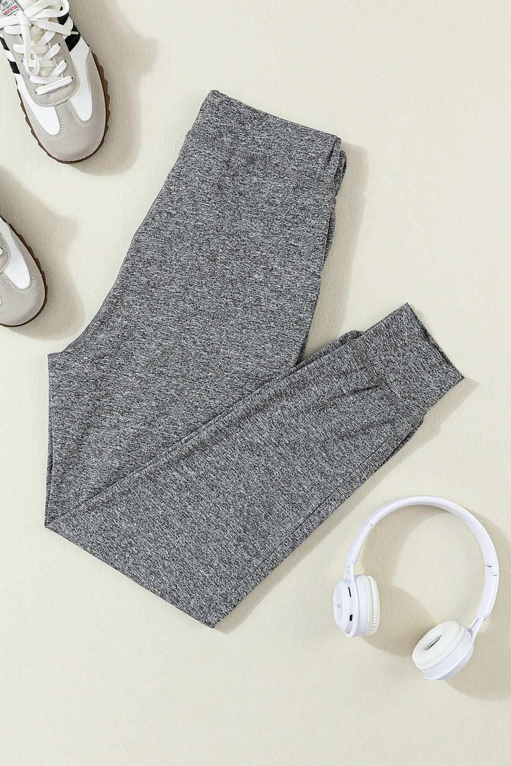 Gray Carmine Juneberry joggers with drawstring waist and side pockets, casual and comfortable for everyday wear.