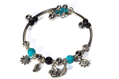 Silver Hestia Spring Love Charm Bracelet with delicate floral and heart charms, showcasing a stylish jewelry accessory.