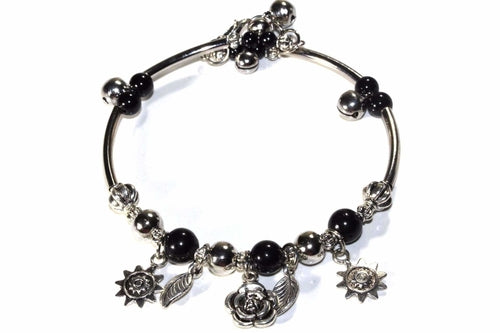 Silver Hestia Spring Love Charm Bracelet featuring colorful floral charms on a delicate silver chain.
