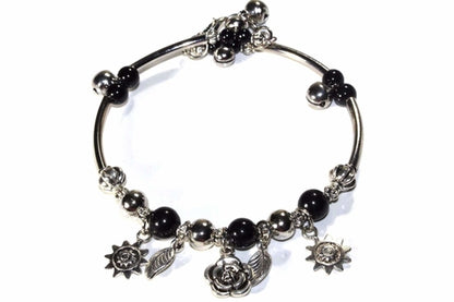 Silver Hestia Spring Love Charm Bracelet featuring colorful floral charms on a delicate silver chain.