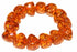 Silver Hestia Baltic Amber bracelet featuring glowing amber beads on a delicate silver chain.
