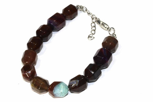 Mixed brown quartz yoga bracelet with silver accents by Silver Hestia, showcasing polished quartz chunks and adjustable cord.