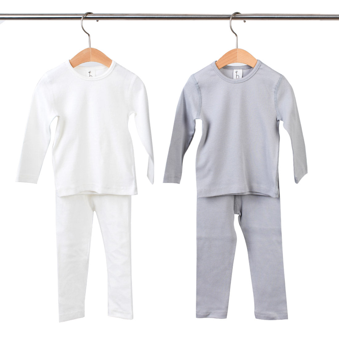 Organic cotton baby toddler pajama set with flat seams from Amber Erebus, featuring soft, comfortable fabric and high-tension design.