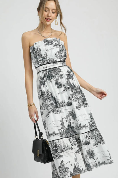 Printed tiered tube midi dress by Umgee featuring colorful floral patterns, sleeveless design, and a relaxed fit.
